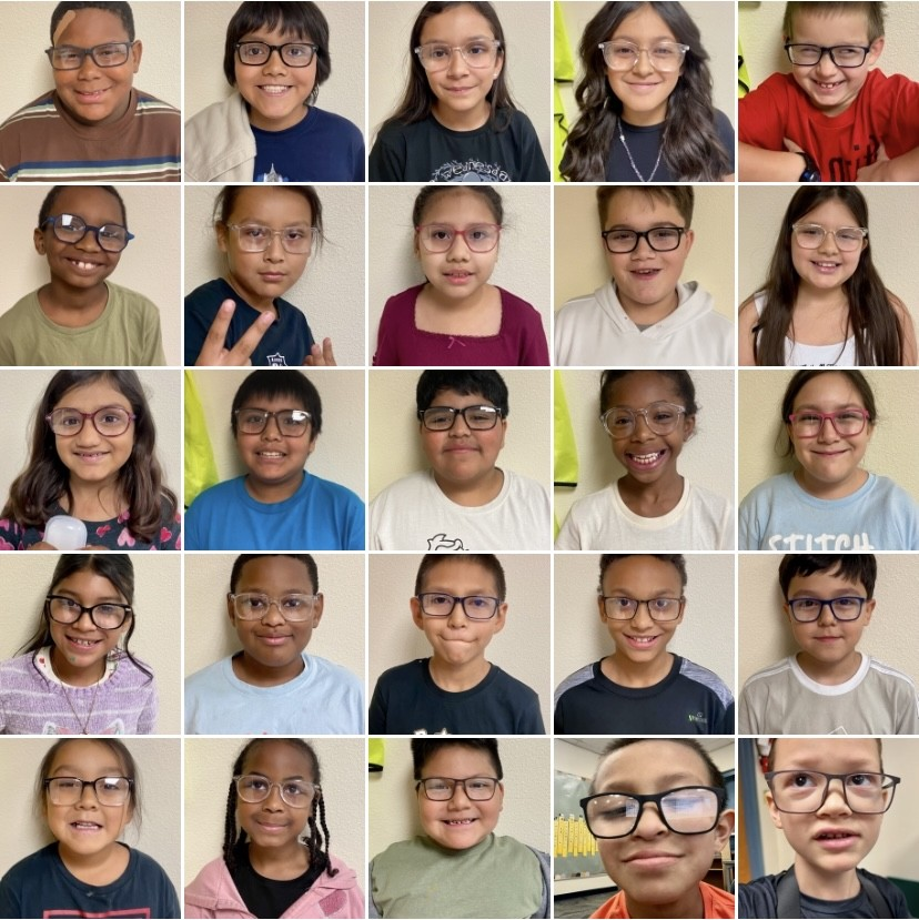 Children wearing their new glasses